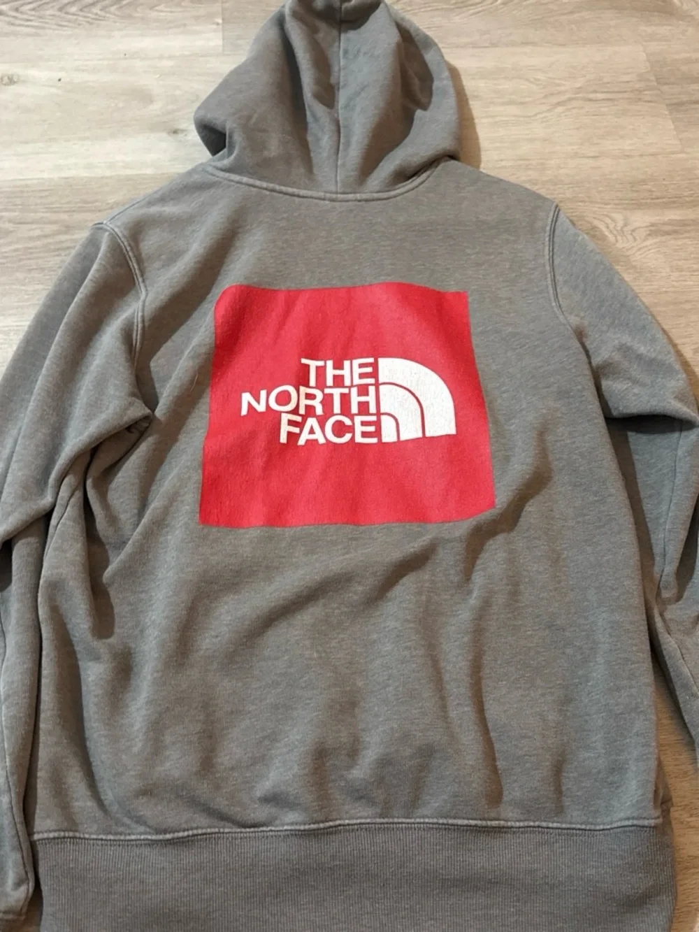 The North Face Gray Hoodie with Red Logo Patch